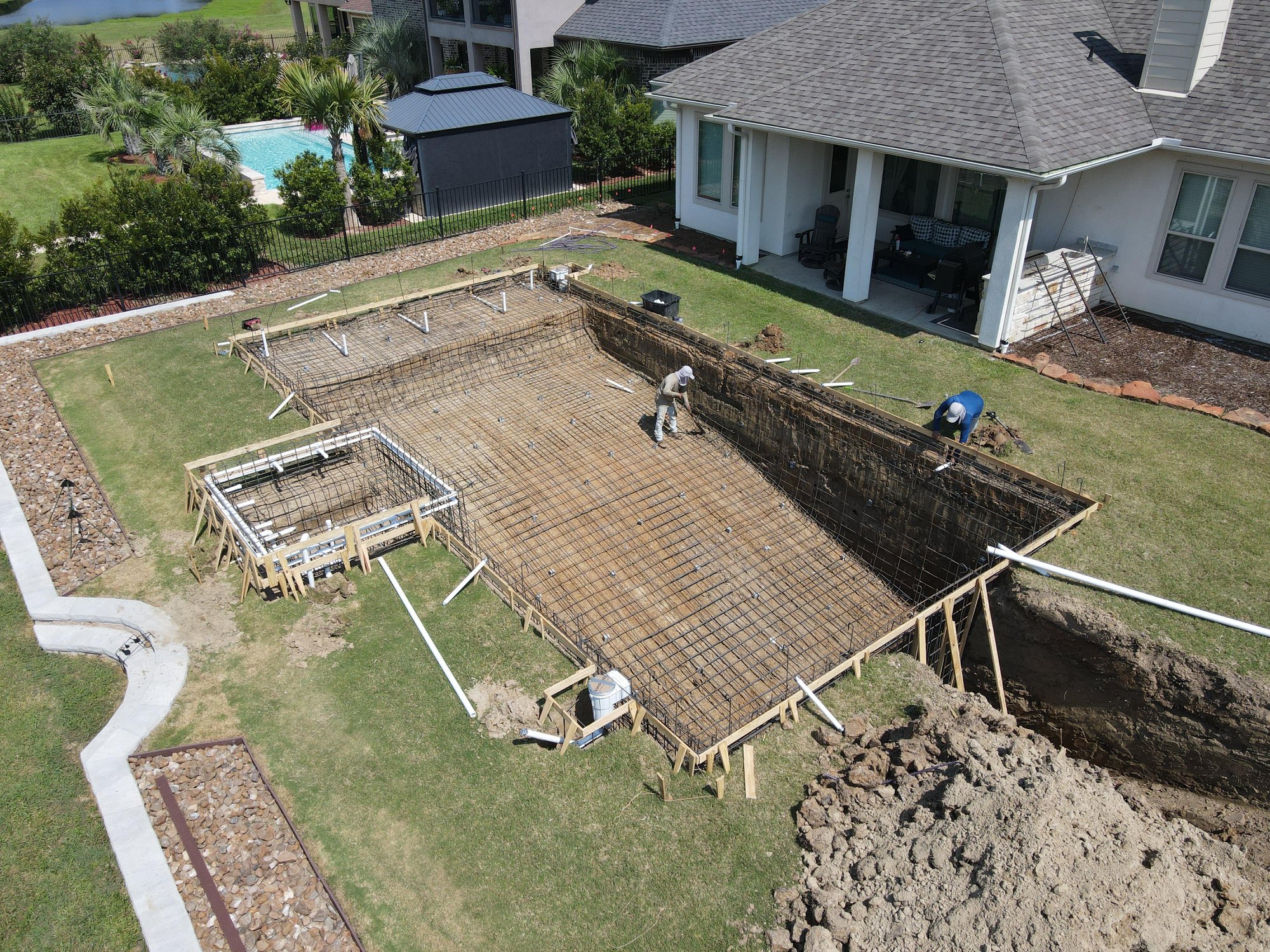 Illustrated pool installation plan with site measurements and project notes
