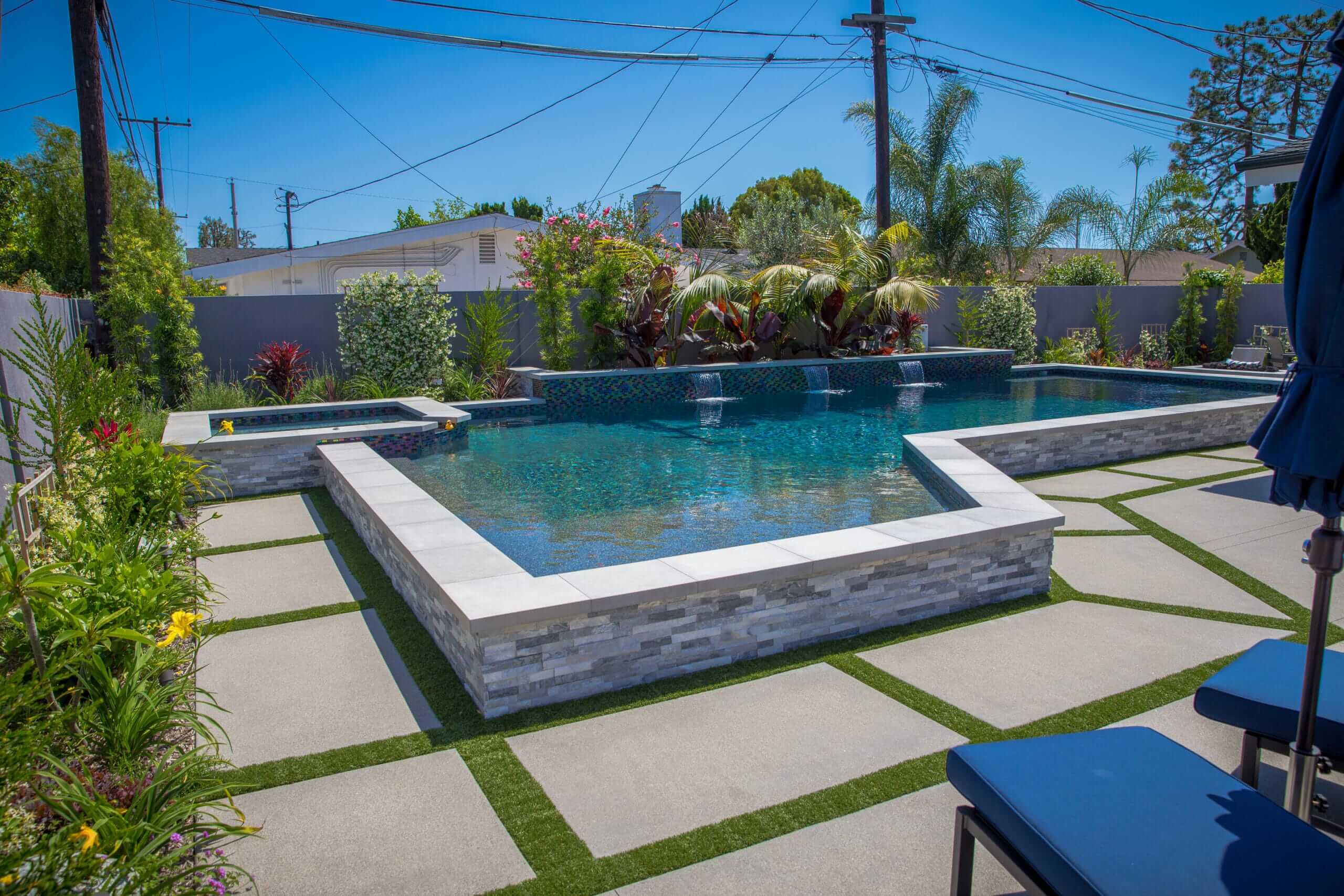 Newly installed residential swimming pool with surrounding outdoor space